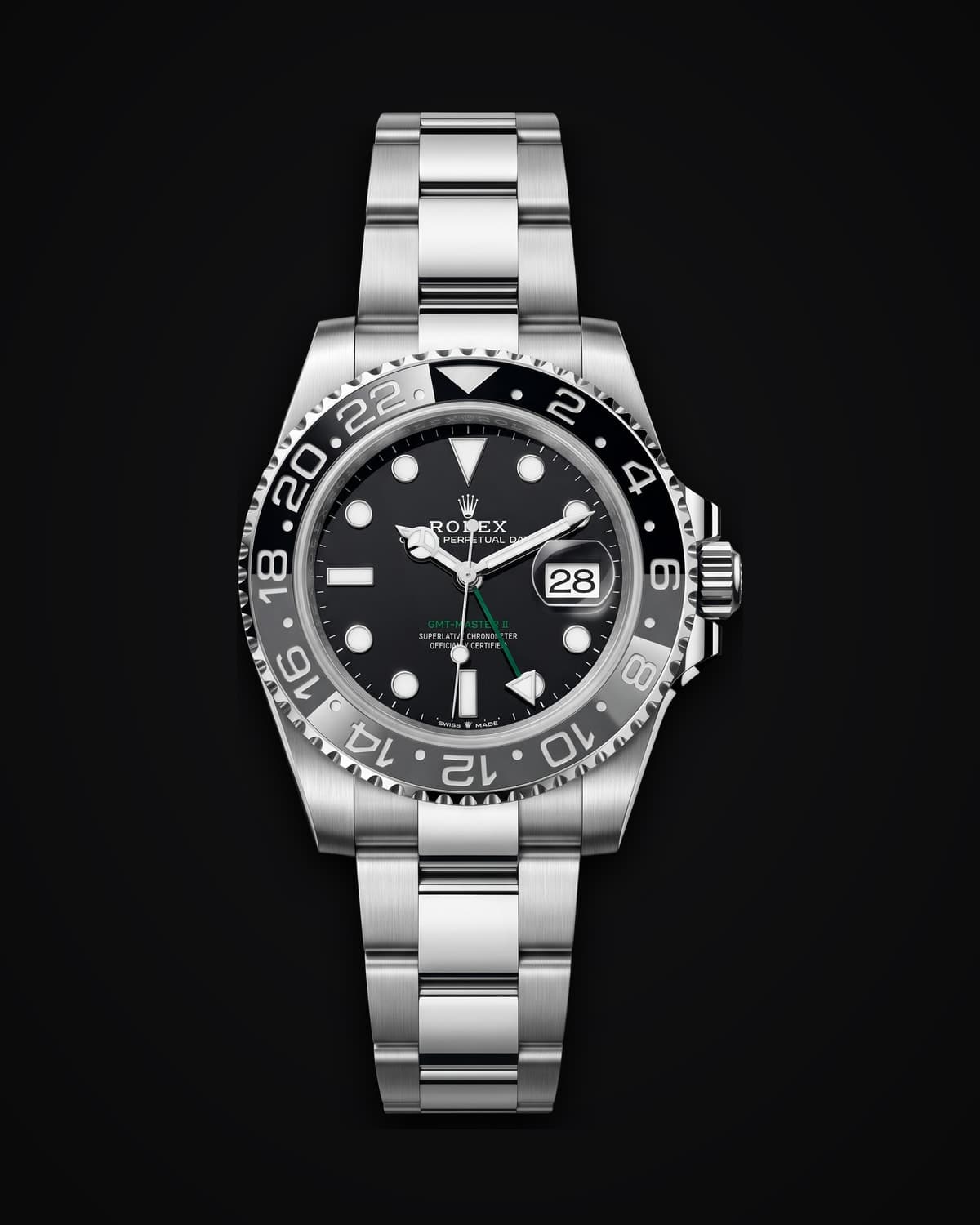 Steel dive watch with a black dial and black bezel on a steel bracelet